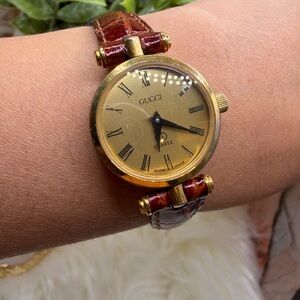 Authentic Gucci Women's Gold Dial Watch with Croc-Embossed Deep Red Strap